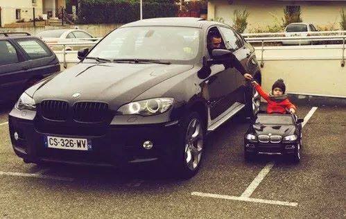 მამა შვილი BMW–ზე
