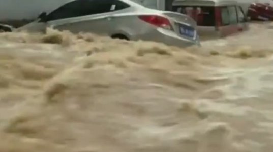 ჩინეთში ძლიერი წვიმების შედეგად 9 ქალაქი დაიტბორა